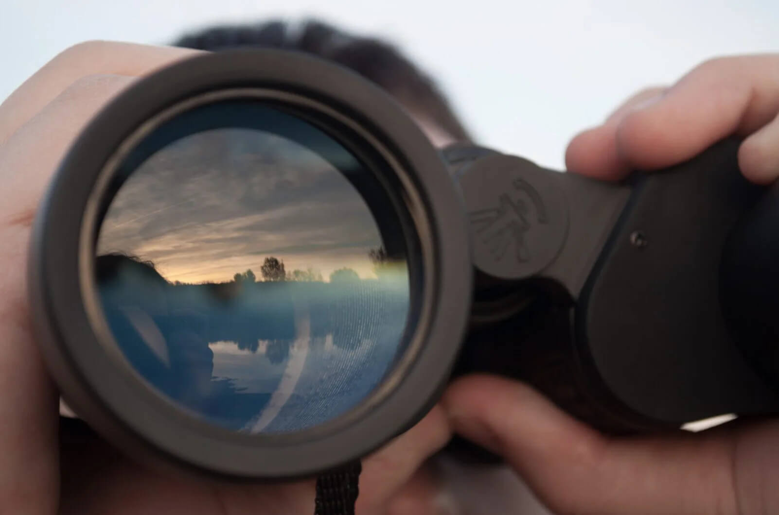 Binoculars close up of a sunset